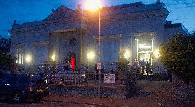 Outside of Theatr Twm or Nant on a warm summer evening